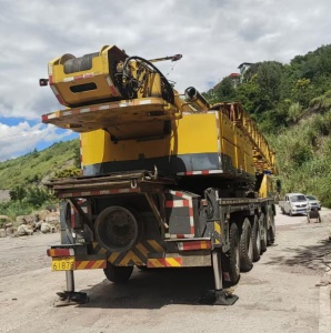 日常检查吊车时，应该重点关注哪些部件？